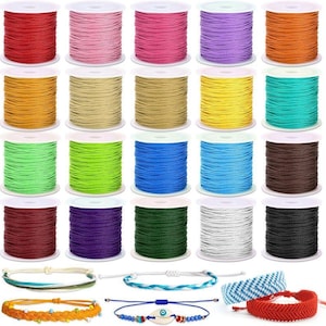 May include: A set of three ceramic mugs with a speckled, matte finish. The mugs are in shades of cream, light gray, and dark gray. Each mug has a simple, minimalist design and a rounded handle. Perfect for coffee or tea.