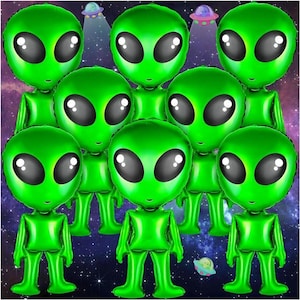 May include: A collection of green alien-shaped foil balloons with large black eyes and small bodies. The balloons are arranged against a space-themed background with flying saucers.