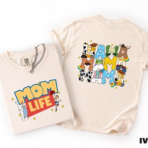 two t-shirts with cartoon characters and text on them.