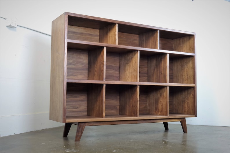 The StudioK is a mid-century modern stereo console for a record player and record storage