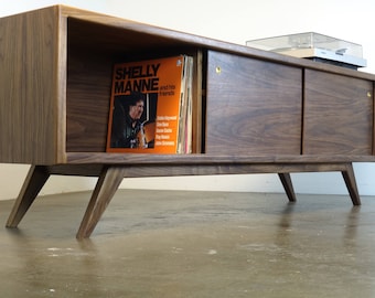 The "BlackPearl" is a mid century modern  console -designed for records, turntable, and audio equipment.