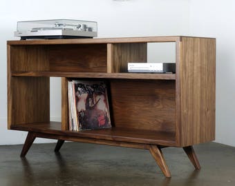 The "A Bomb" is a mid century modern  console -designed for records, turntable, and audio equipment.