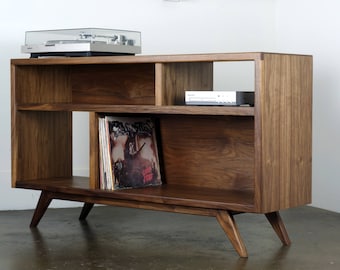The "A Bomb" is a mid century modern  console -designed for records, turntable, and audio equipment.