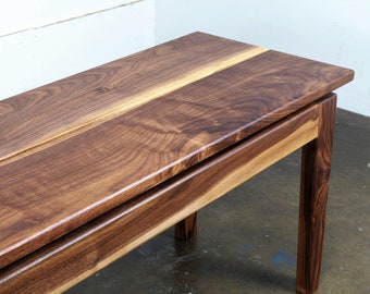 The "Chief" mid century modern bench in solid walnut