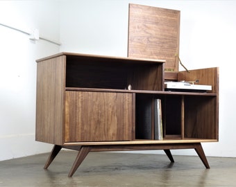 Mid century modern record player console. record storage The "Electric Kool Aid"
