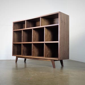 The StudioK is a mid-century modern stereo console for a record player and record storage image 7