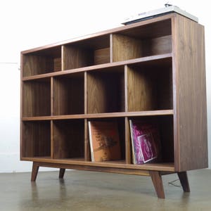 The StudioK is a mid-century modern stereo console for a record player and record storage image 2