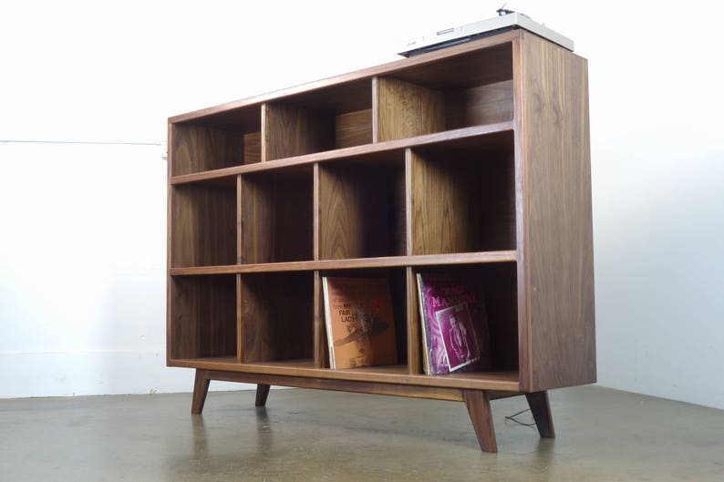 The StudioK is a mid-century modern stereo console for a record player and record storage