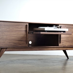 The "BlackGold" is a mid century modern TV console, record player pull out