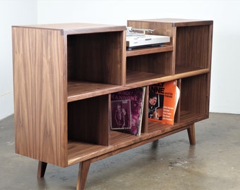 Mid-century modern stereo console for a record player and record storage. The " Cloud9"