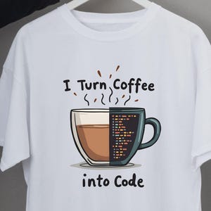 May include: White t-shirt featuring a coffee cup design split into coffee and code. The text reads "I Turn Coffee into Code". A humorous design for those who enjoy coffee and coding, printed on a white t-shirt.