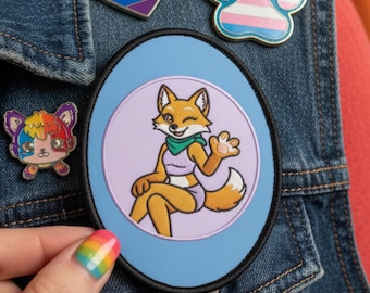 Naszywka z futrzanym futerkiem Krissy Orange Fox | Niebiesko-fioletowa owalna naszywka z futrem