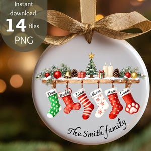 May include: A round white ceramic ornament with a gold ribbon, featuring a watercolor illustration of a wooden shelf holding six Christmas stockings labeled Dad, Buddy, Liam, Mom, Ann, and Luna, with the text The Smith family below the stockings.
