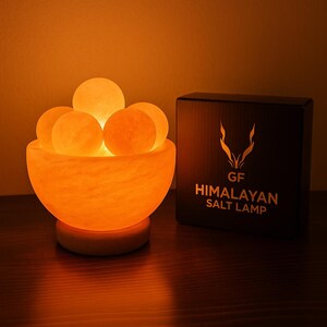 thumbnail interactive-video image 1 of Natural Orange Selenite Sphere – Crystal Ball For Reiki Healing & Massage (Choose Size) 1 of 5