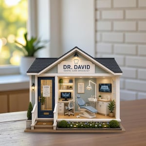 May include: A miniature dental office model labeled DR. DAVID DENTAL CARE SPECIALIST. The structure features a blue front door with an OPEN sign, a light blue dental chair, a computer desk, a sink, and dental equipment, all illuminated by interior lights.