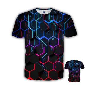 May include: Black t-shirt with a vibrant geometric design. The design features a honeycomb pattern with interconnected lines in red, blue, and purple. A smaller version of the shirt is visible in the lower right corner.
