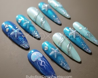 Uñas postizas oceánicas hechas a mano, diseño de estrellas de mar y medusas, degradado con purpurina aguamarina
