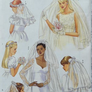 May include: A vintage Butterick sewing pattern featuring illustrations of bridal gowns and veils. The designs include various styles of wedding dresses with different sleeve lengths, necklines, and veil designs. The pattern includes the text "ALL SIZES INCLUDED".