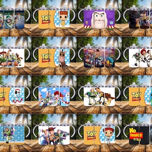 May include: A collection of sippy cups featuring various characters from the animated movie "Toy Story." The cups have white handles and lids, with colorful designs of Woody, Buzz Lightyear, and other characters. Some cups have the text "TOY STORY".