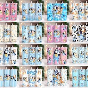 May include: A collection of cylindrical tumblers featuring Bluey and Bingo characters in various colorful patterns, including polka dots, paw prints, and floral designs. Each tumbler includes a clear straw and displays the Bluey logo text.