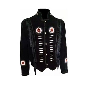 May include: A black jacket featuring long fringe detailing along the chest and sleeves. The front is adorned with two circular beaded medallions in red, white, and black, alongside vertical rows of white bone-style accents and silver buttons.