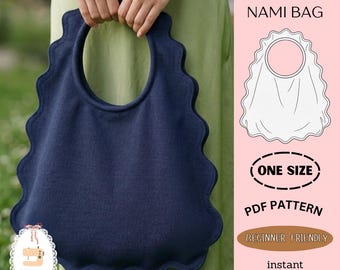 May include: A dark blue fabric bag with a scalloped edge and a circular cutout handle. The image includes text reading JAPANESE NAMI BAG, ONE SIZE, PDF PATTERN, BEGINNER FRIENDLY, and instant download, alongside a line drawing of the bag design.