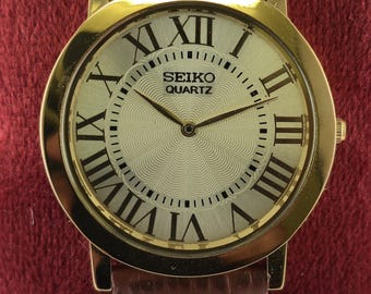 Seiko Slim Men's Tank Quartz Vintage Wrist Watch | Golden Dial | Leather Band | Roman Numerals | Round Shape | DDP for US Customers