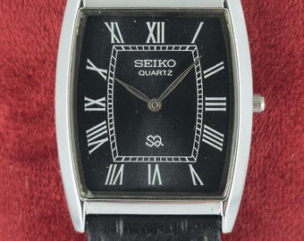 Seiko Slim Men's Tank Quartz Vintage Wrist Watch | Black Dial | Black Leather Band | Roman Numerals | Rectangle Shape | DDP for US Customers