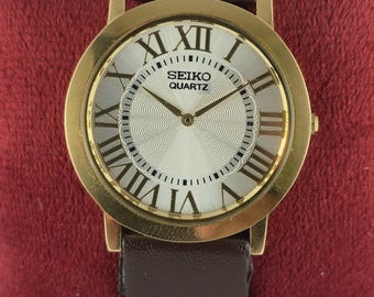 Tank Style Seiko Slim White Dial Leather Band Men Quartz Wristwatch : Roman Numerals, Round Shape