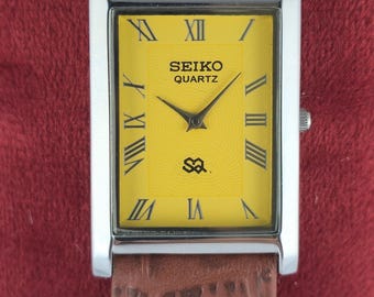 Tank Style Seiko Slim Yellow Dial Leather Band Men Quartz Wristwatch, Roman Numerals, Rectangle Shape