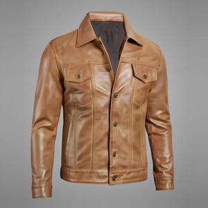 Könnte beinhalten: Hellbraune Lederjacke mit klassischem Design. Die Jacke hat einen Kragen, zwei Brusttaschen mit Knopfverschluss und geknöpfte Manschetten. Die Jacke hat eine Knopfleiste und eine taillierte Passform, geeignet für verschiedene Anlässe.