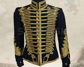 May include: Black military-style jacket with gold embroidery and button details. The jacket features a high collar and ornate gold embellishments across the chest and sleeves. A formal garment with a historical aesthetic.