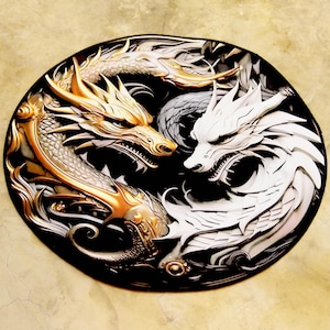 May include: A circular decorative piece featuring two dragons in a yin-yang design. One dragon is gold and the other is white, set against a black background. The dragons are intricately detailed with scales and sharp features.
