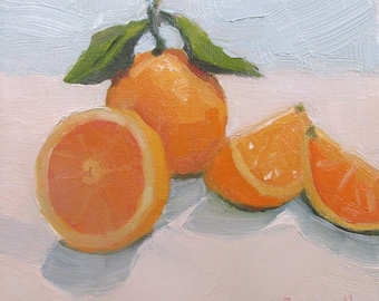 May include: A still life painting of oranges. A whole orange with green leaves sits on a white surface with three orange slices beside it. The painting is done in a realistic style with visible brushstrokes.