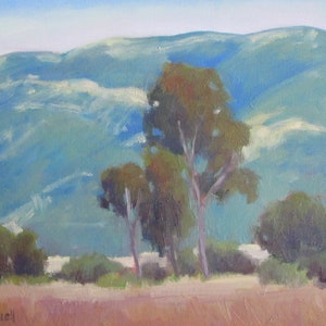 May include: A painting of a landscape with a blue sky and green hills. There are three trees in the foreground, and the hills are in the background.