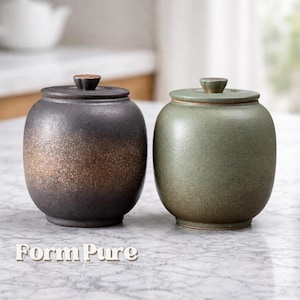 Pote de armazenamento artesanal em cerâmica japonesa dourada e celadon para chá.