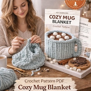 May include: A cozy mug blanket crochet pattern is shown, with a woman crocheting a light blue blanket. The pattern is a digital download. The finished blanket resembles a large mug filled with marshmallows. The image includes the text "Cozy Mug Blanket".