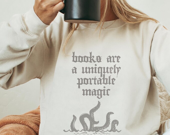 Featured listing image: Cozy Reader Sweatshirt, Books Are Magic Shirt, Book Lover Attire, Dark Academia Top, Reading Enthusiast Gift