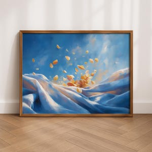 May include: A framed horizontal wall art print featuring an abstract painting of flowing blue fabric waves with a central cluster of floating golden yellow petals or leaves rising upward against a deep blue sky-like background with soft light.