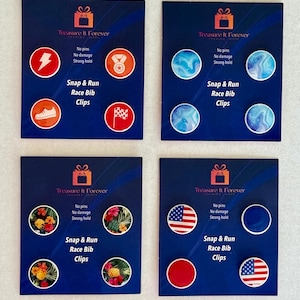 May include: Four sets of Snap & Run race bib clips. Each set features four round clips with various designs, including a lightning bolt, a medal, a running shoe, a checkered flag, and abstract patterns. The text "Treasure It Forever" is at the top.