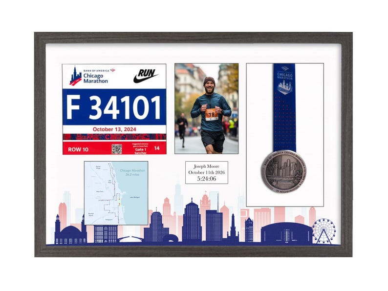 May include: A dark wood-framed display case featuring a Chicago Marathon race bib with number F 34101, a photograph of a runner, a finisher medal with a blue ribbon, a map of the course, and a plaque reading Joseph Moore October 11th 2026 5:24:06.