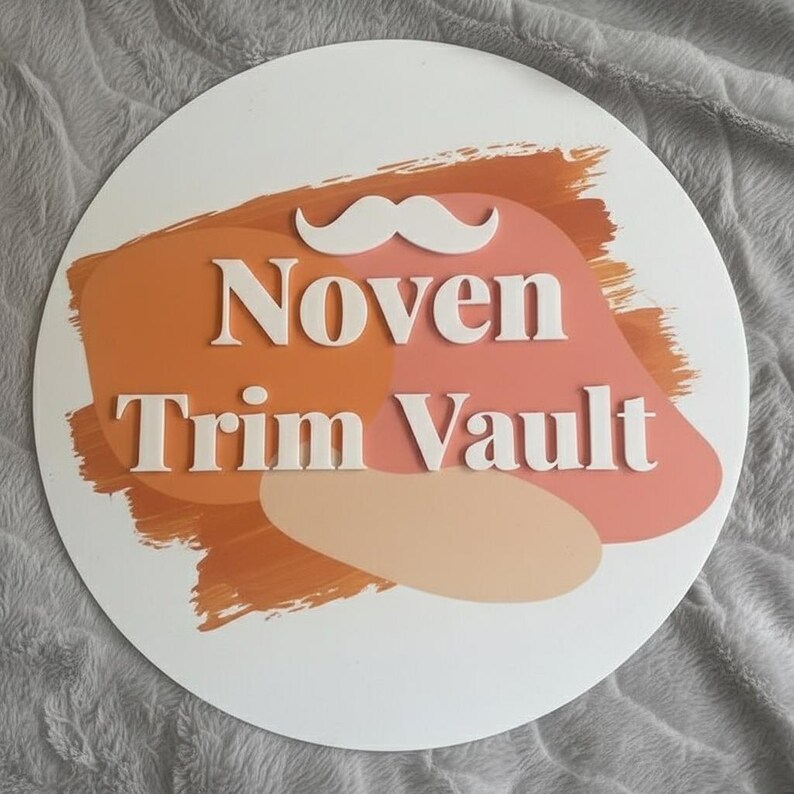 May include: A white, circular sign with the text "Noven Trim Vault" in white, bold letters. The sign features a white mustache graphic above the text. The background has orange, peach, and pink brushstroke designs.