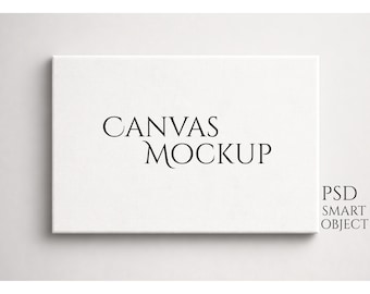 Könnte beinhalten: Ein rechteckiger, weißer Leinwand-Mockup mit den schwarzen Worten "CANVAS MOCKUP". Die Worte "PSD SMART OBJECT" befinden sich in der unteren rechten Ecke. Die Leinwand befindet sich auf einem weißen Hintergrund.
