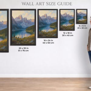 Puede incluir: Impresiones art&iacute;sticas de paisajes enmarcadas en varios tama&ntilde;os: 61 x 91 cm, 51 x 76 cm, 40 x 60 cm, 30 x 45 cm y 20 x 30 cm. Las obras representan una escena de lago de monta&ntilde;a. El texto "WALL ART SIZE GUIDE" es visible.