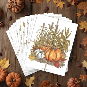 Open autumn coloring pages showing pumpkins and fall leaves, printable harvest activity for kids and adults.