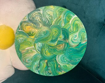 Cuadro de círculos en espiral verdes y amarillos