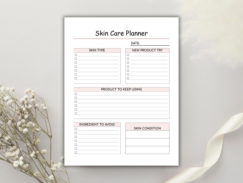 May include: A white Skin Care Planner with pink accents. The planner includes sections for skin type, new product trials, products to keep using, ingredients to avoid, and skin condition. The title "Skin Care Planner" is at the top.