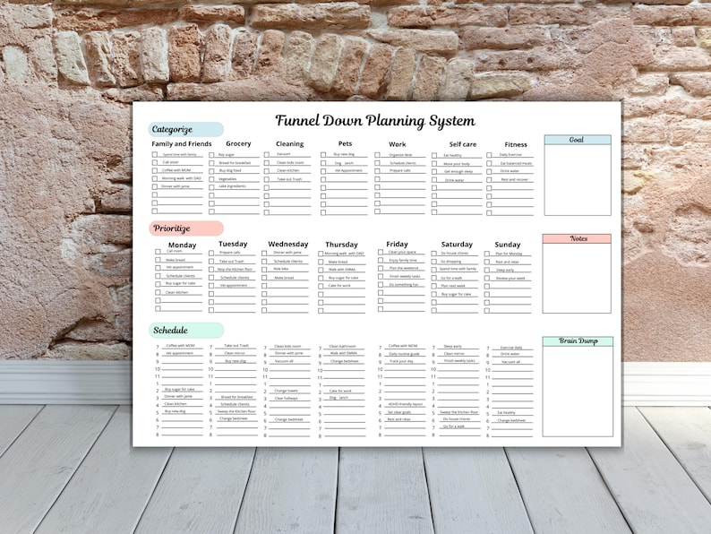 May include: A white planner titled "Funnel Down Planning System" with sections for categorization, prioritization, and scheduling. The planner includes checkboxes for tasks related to family, grocery, cleaning, pets, work, self-care, and fitness.