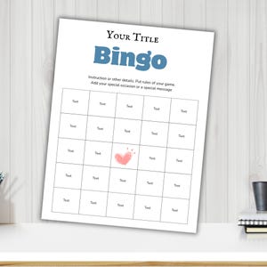 May include: A white Bingo game sheet with a blue title and the word "Bingo" in large, blue letters. The sheet has a grid of boxes with the word "Text" in each. A pink heart graphic is in one box. Instructions are at the top.