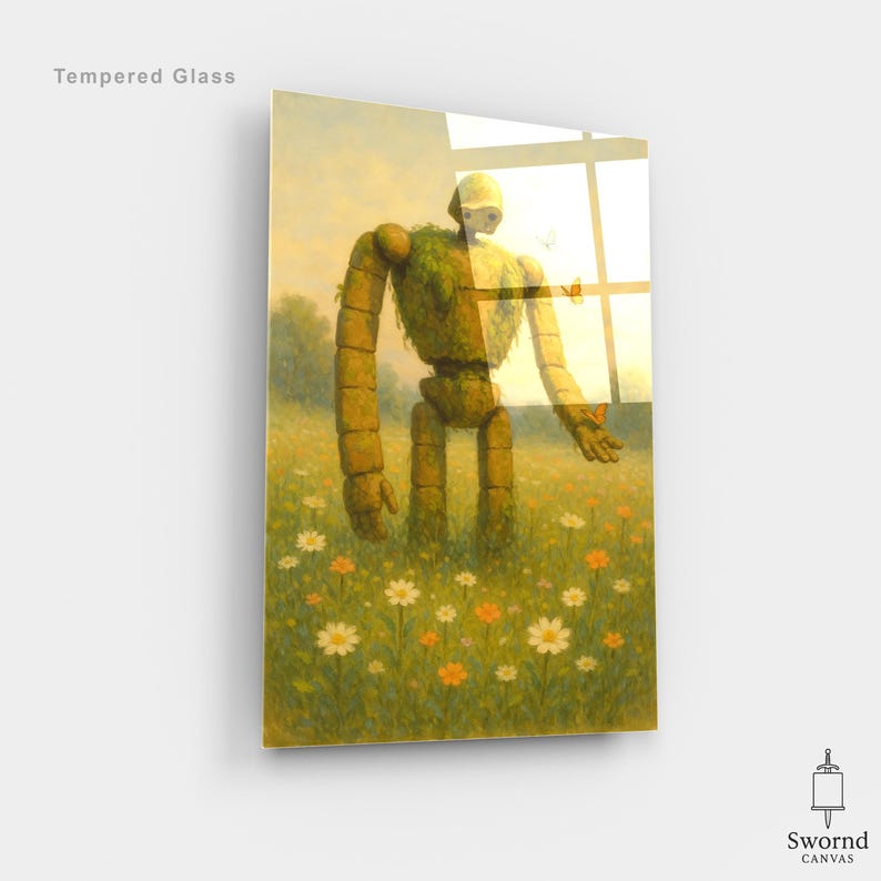May include: Tempered glass art print depicting a large, animated robot in a field of wildflowers. The robot is made of stone and covered in greenery. The artwork has a soft, painterly style with a warm colour palette. The text "Tempered Glass" is visible.